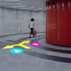 Señalización luminosa proyectada sobre el suelo para el transporte público